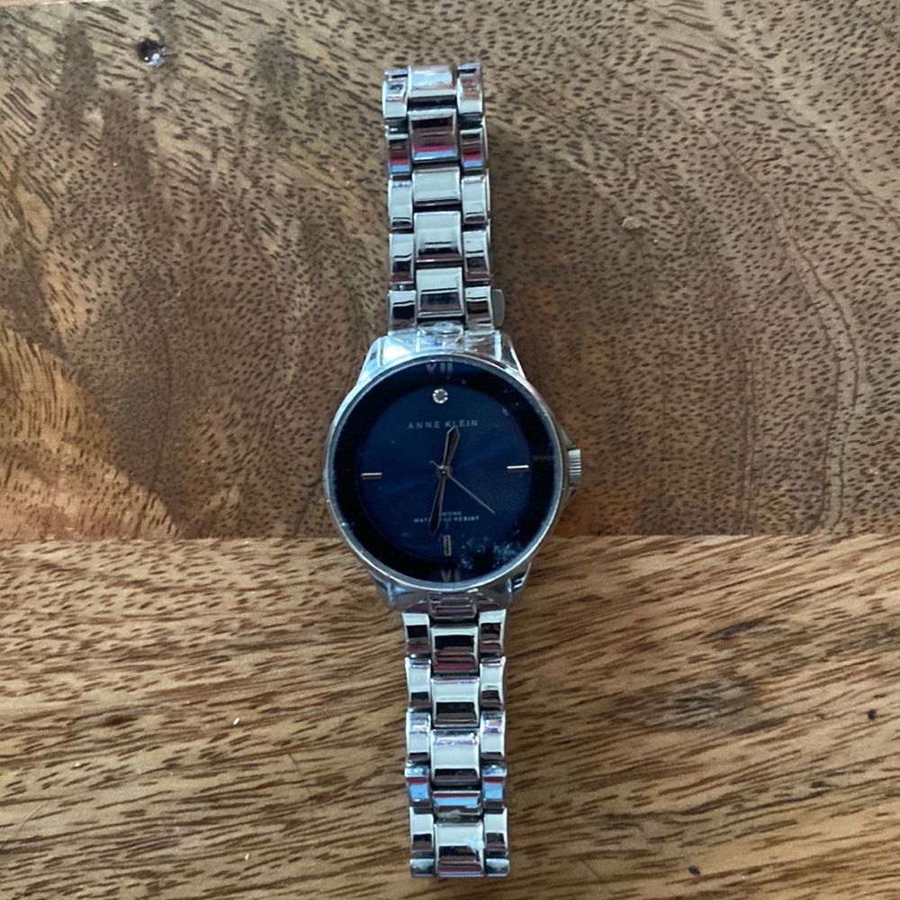 Pretty Anne Kein watch with blue face and small stone